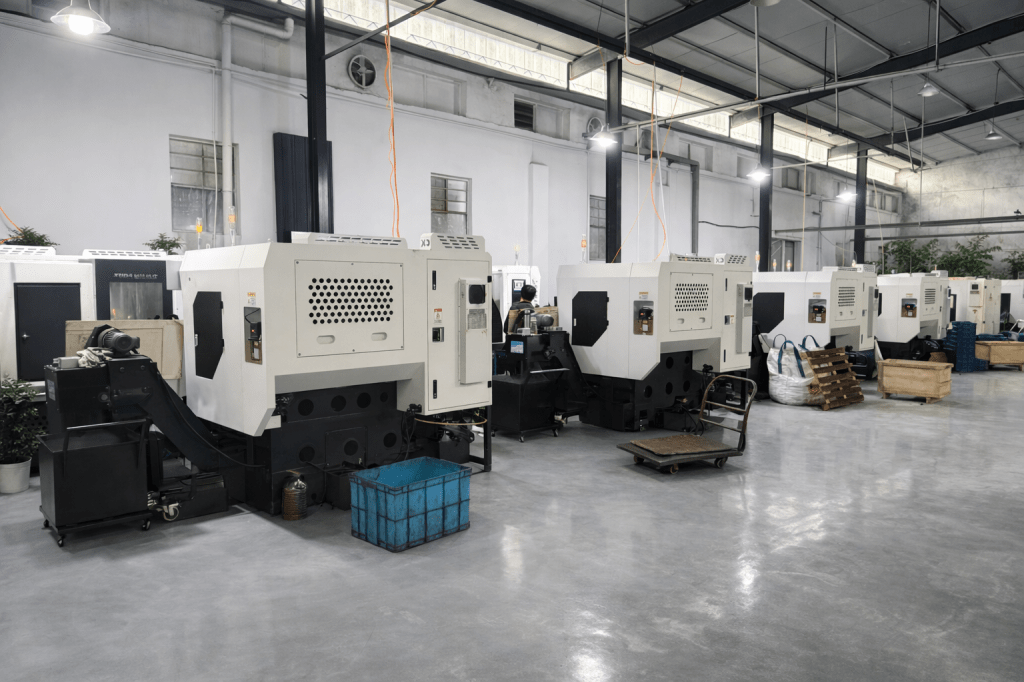 CNC machine tools for batch metal parts production in factory